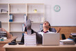 © Elnur - Young male employee extremely tired with excessive work