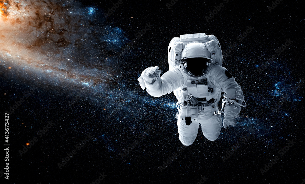 Astronaut spaceman do spacewalk while working for space station in ...