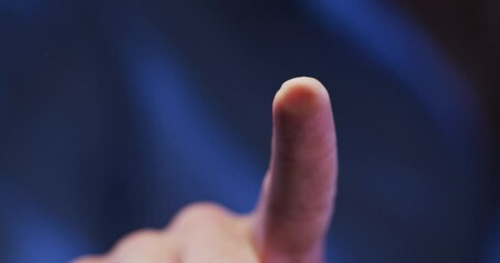 Wall Mural - index finger of caucasian man using digital interface applying fingerprint to touchscreen