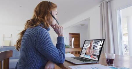 Poster - Caucasian woman using laptop and phone headset on video call with female colleague