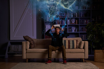 Wall Mural - man uses virtual reality glasses to see the worlds of distant planets. elements of this image furnis