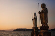 © Cavan Images - Sculptures by Lake Shinji against clear sky during sunset