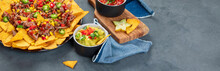 Hispanic Mexican Food, Nachos With Meat, Corn And Halapenjo On Dark Background