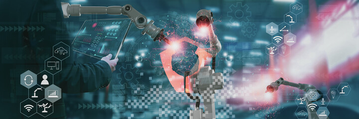 Wall Mural - industry engineer in factory,using smart tablet glass device,control automated robot arm machine lea