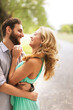 © Cavan Images - Close-up of happy couple embracing on road
