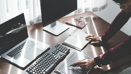 Wall Mural - programmer working in a software development and coding technologies. website design. technology con