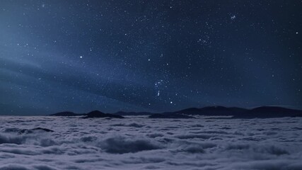 Wall Mural - starry night sky with milky way stars motion over wild foggy mountains nature landscape in epic blue