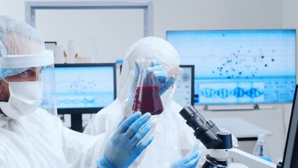 Wall Mural - professional team of scientists is working on a vaccine in a modern scientific research laboratory. 