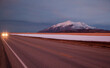 © Cavan Images - Beautiful snowy mountain and road at dusk, Utah, USA
