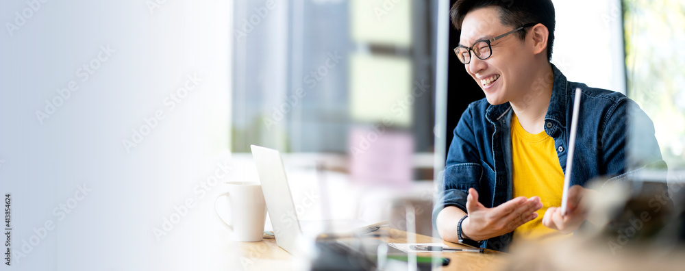 Smart positive smile asian male businessman video conference remote working  discuss concersation about strategy business planing new business startup ideas concept,business meeting online via laptop - obrazy, fototapety, plakaty 