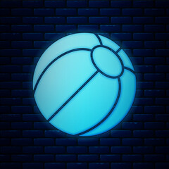 Sticker - Glowing neon Beach ball icon isolated on brick wall background. Vector.