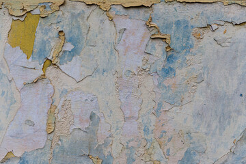 texture of old wall with cracks and peeled paint