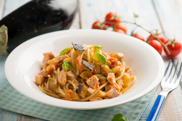 Canvas Print - spaghetti with fresh salmon tomatoes and eggplant