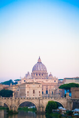 Wall Mural - Sunset on Tiber river bridge with Vatican City - Rome, Italy