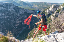 Climber Throwing The Rope, Gorges Du Verdon, France