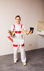 Wall Mural - Fully equiped professional repairman ready for work