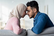 © Prostock-studio - Closeup of loving muslim couple bonding at home