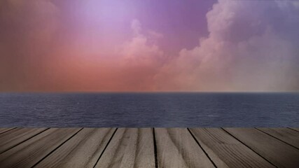 Wall Mural - boardwalk on the ocean with cloudy sky 4k loop features a view from a boardwalk of the ocean with mo