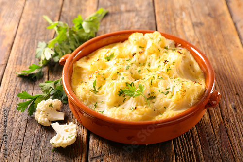 baked cauliflower gratin with cream and cheese © M.studio
