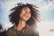 © deagreez - Photo of charming cheerful wavy hairdo dark skin person toothy smile closed eyes have good mood vacation free time outdoors