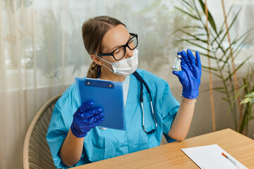 Close up portrait of Caucasian female doctor immunologist in cabinet in hospital