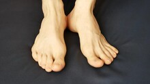 Close-up Of The Feet Of A Man Wiggling The Toes