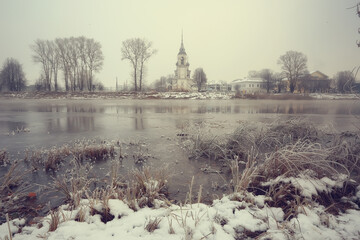 Wall Mural - winter landscape church on the banks of the freezing river in vologda, christianity baptism russia christmas