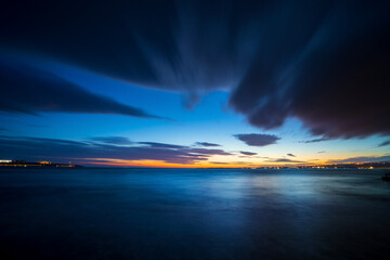 Wall Mural - Beautiful seascape in twilight. Photo on long exposure of sea surface after sunset in evening.