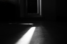Sun Rays On A Wooden Floor, Dark Interior, Contrast, Selective Focus 