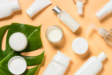 Fototapete - Natural cosmetic products at color background. Cream, mask, lotion for face and body care. Flat lay image.