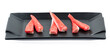 fresh raw crab stick sliced on square plate isolated on white background, shabu, hot pot ingredients