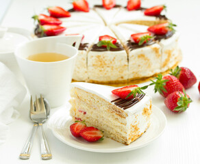 Wall Mural - Sponge cake with strawberries and cream. Selective focus.