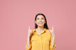 Young brunette smiling happy nice cute latin happy attractive cute woman 20s wear yellow shirt point index finger overhead on workspace area mock up isolated on pastel pink background studio portrait