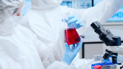 Wall Mural - professional team of scientists is working on a vaccine in a modern scientific research laboratory. 