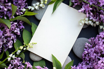 Mockup invitation card with card lilac on black table. background with copy place. greetings