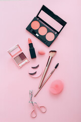 Wall Mural - Female accessories for make up on pink background. Beauty concept.