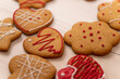 © zerbob2 - Handmade gingerbread cookies with a pattern on a wooden surface