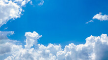 Blue sky with white beautiful clouds in a sunny day picture image background photography