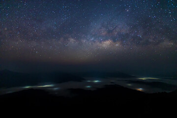 Wall Mural - milky way galaxy at night. image contains noise and grain due to high iso. image also contains soft 