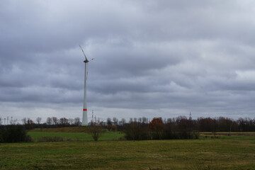 beautiful view of a windmill of north berlin on a foggy day