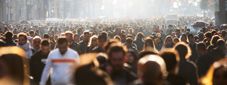 Fototapete - Blurred crowd of unrecognizable at the street