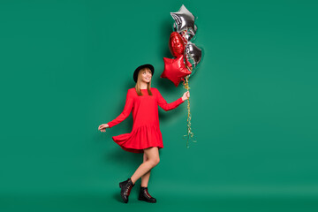 Sticker - Photo of lady look empty space hold air balloons wear hat red dress footwear isolated green color background