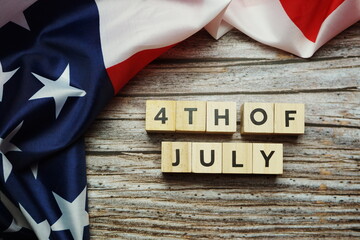 Wall Mural - Fourth of July alphabet letter on wooden background