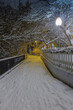 snow-covered alleyway in the evening