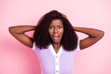 Sticker - Portrait of attractive furious wild wavy-haired girl scolding bad reaction isolated over pink pastel color background