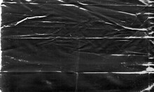 Background Texture Of A Polyethylene,plastic Transparent Black Plastic Film,transparent Stretched Background