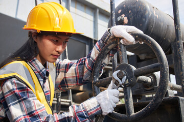 A female laborer working outdoors.