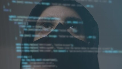 Cyber hacker or spyware with binary code on the screen