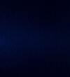 Dark blue artificial leather surface and dark blue background