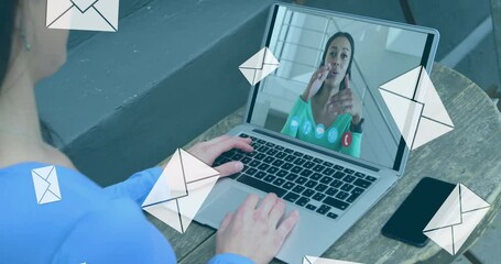 Sticker - Animation of digital envelope mail icons over woman using laptop on video call